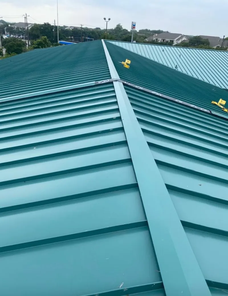 Green commercial metal roof ridge and valley for Metal Roof Repair in East Rochester