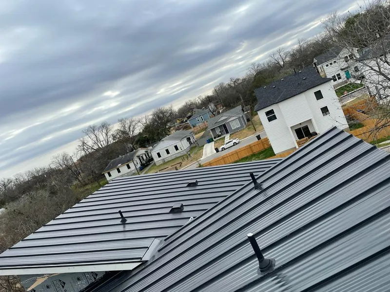 Standing seam metal roof panels with vents for Skylight Repair in East Rochester